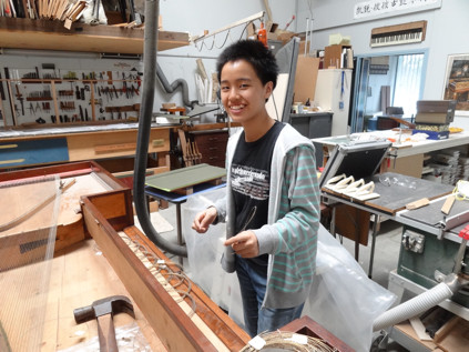 Lisa in the harpsichord workshop 59K jpeg